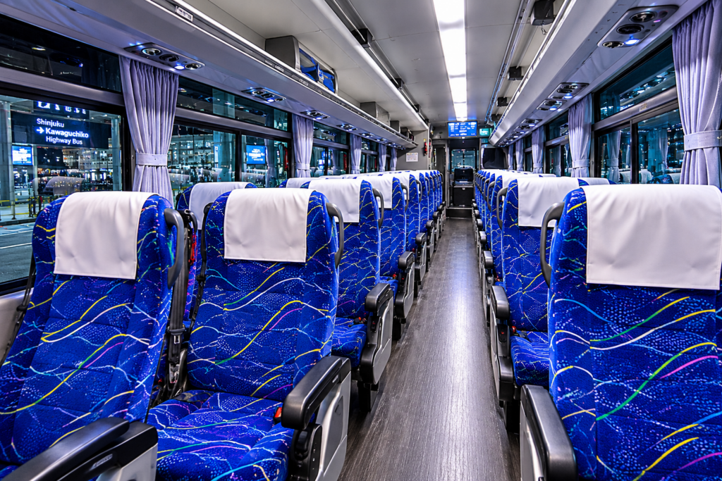 Comfortable interior of a highway bus traveling from Tokyo Shinjuku to Lake Kawaguchi with spacious seating and large windows