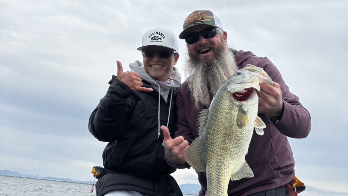 Lake Biwa fishing guide Yusuke Tanaka with a guest and a big largemouth bass