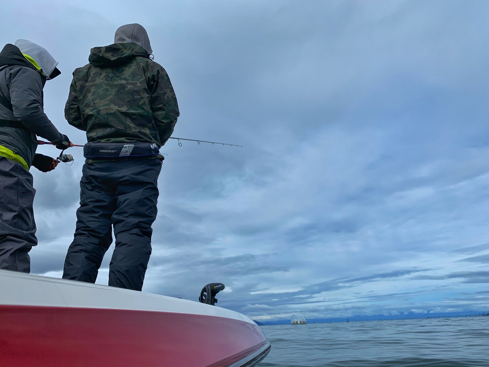 Guests fishing neko rigs from a Lake Biwa guide boat